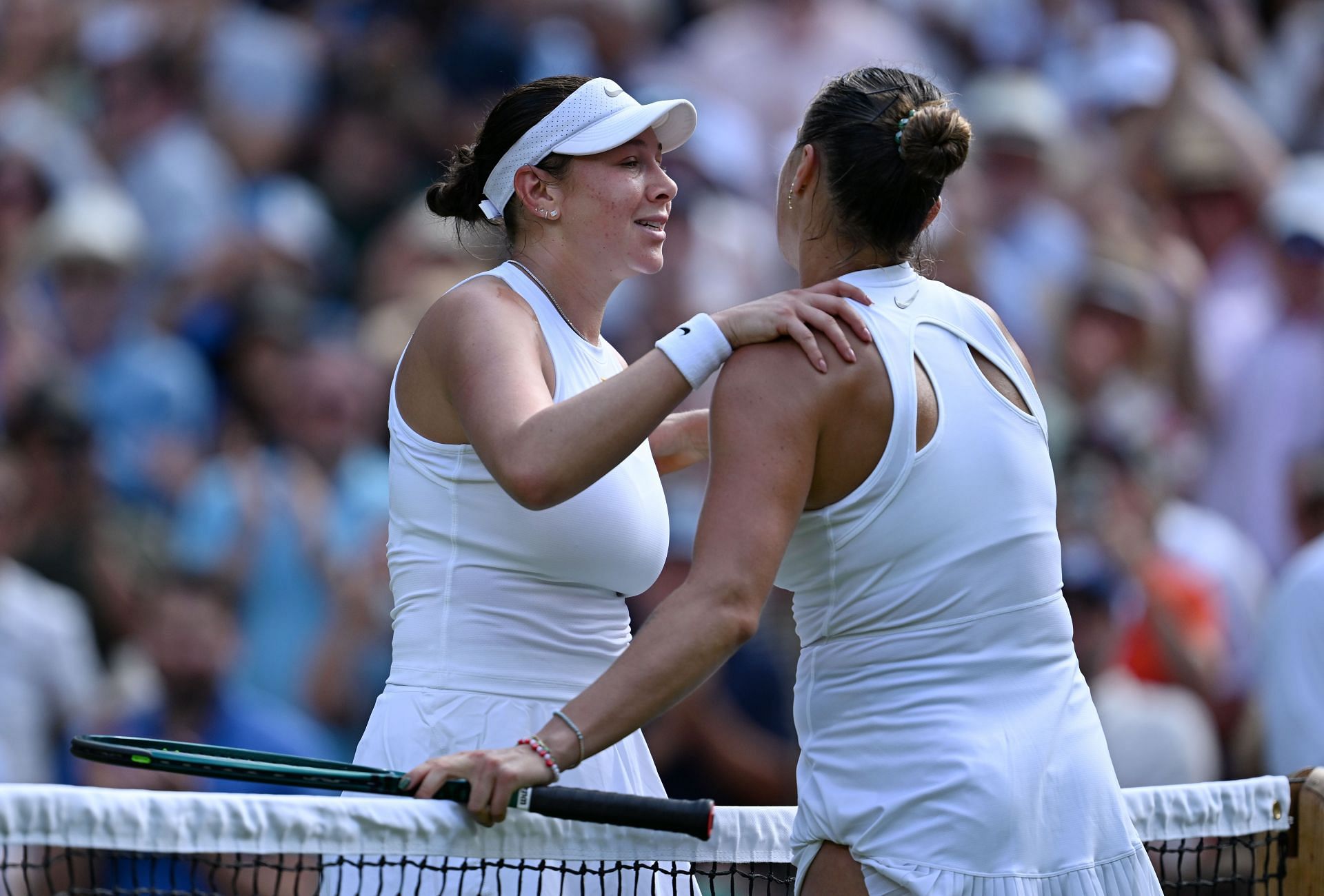 Aryna Sabalenka and Amanda Anisimova embrace at Wimbledon 2025 - Image Source: Getty